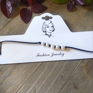 Cultured 5 pearl suede leatherette choker necklace.